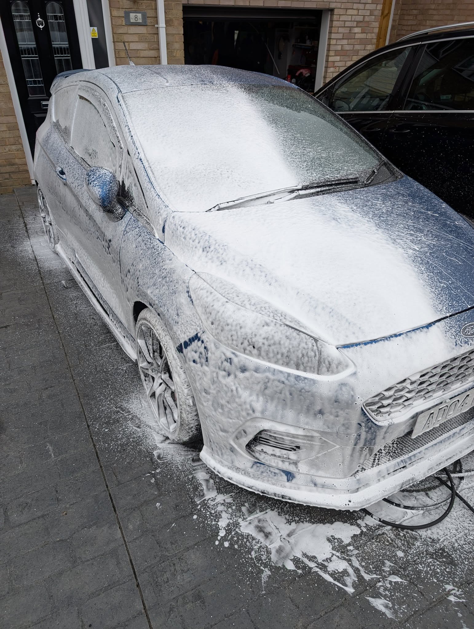Weekend Warrior Snowed Under snow foam being used for pre-contact car cleaning